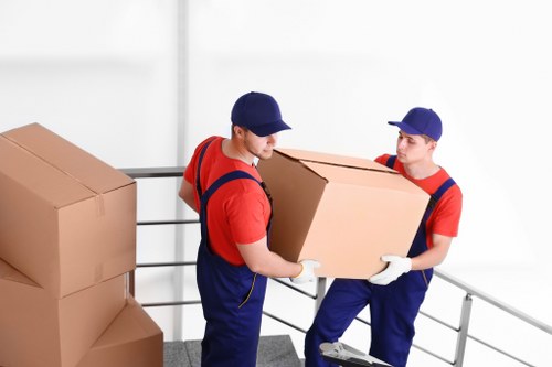 Furniture removals team handling delicate items in Belgravia