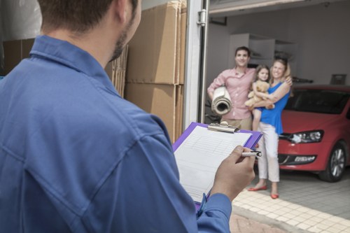 Careful loading of furniture into a moving truck in Belgravia