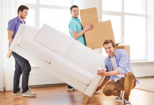 Removal van and movers handling a local Belgravia property move