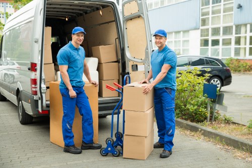 Removal crew loading furniture for a same day move in Belgravia