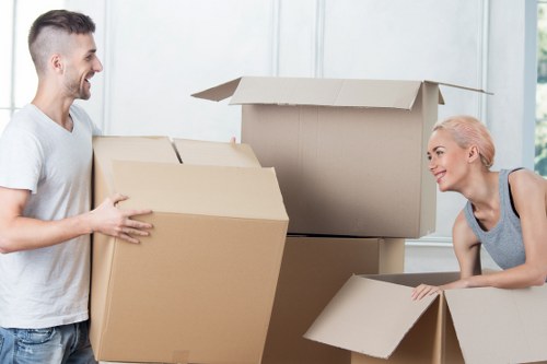 Careful handling of a grand piano during removal in Belgravia