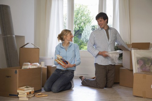 Packed household boxes and moving supplies prepared for removal in Belgravia