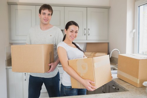 House removalists in Belgravia transporting boxes and furniture during a local move